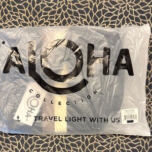ALOHA Collection Crossbody
Le Voyageur